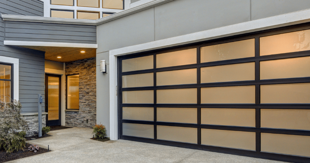 Double black garage doors with window panels