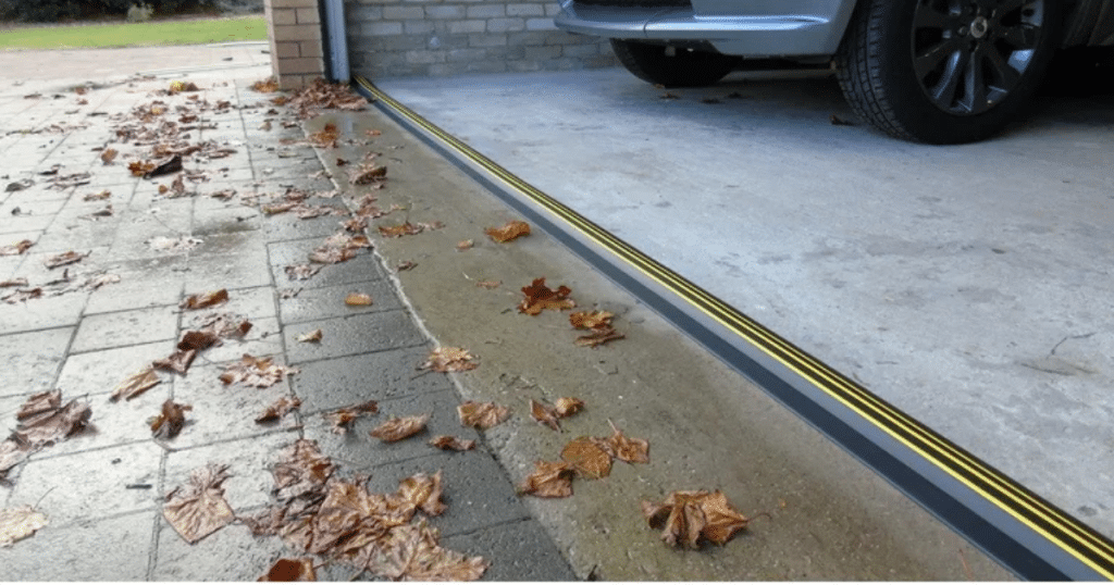 how to install garage door weather stripping