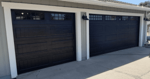 black garage doors with windows